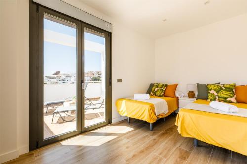 Posteľ alebo postele v izbe v ubytovaní A&N Viñuela Luxury centro