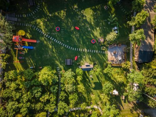 an overhead view of a park with trees and a train at Sapanca Cayir Cimen Otel in Sapanca