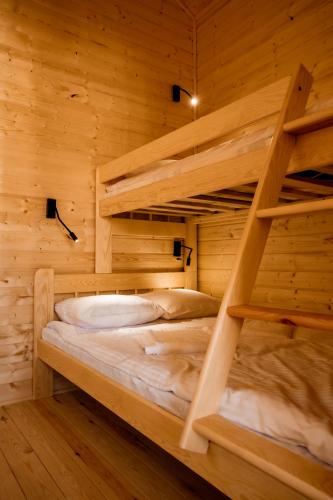 Cama o camas de una habitación en Osada Zator Family Resort & SPA