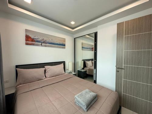 Postel nebo postele na pokoji v ubytování One Bedroom Apartment Arcadia Beach Continental