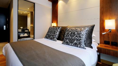 Letto o letti in una camera di Puerto Norte Design Hotel