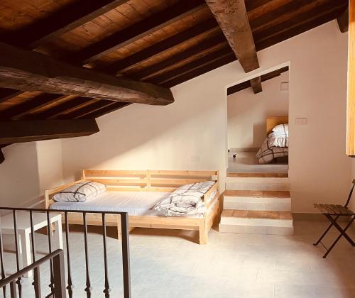 Cama o camas de una habitación en Casa in Umbria - nella Valle del Menotre vicino Rasiglia, Foligno, Assisi,Perugia