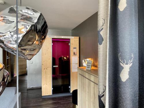 Телевизор и/или развлекательный центр в NaturBoutique Hotel RAUSZEIT