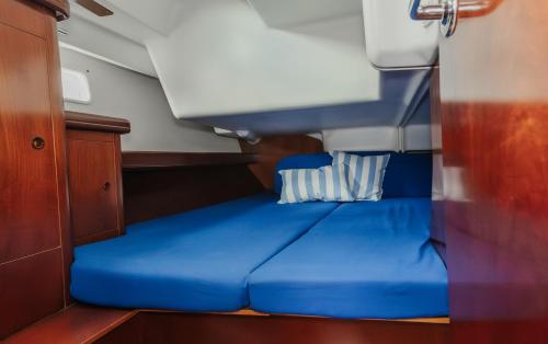 a blue bed in the back of a boat at BBoats in Lisbon