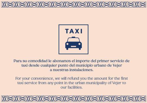 ein Schild für ein Taxi mit Foto eines Autos in der Unterkunft Hotel Boutique V in Vejer de la Frontera