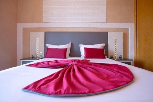 Una cama o camas en una habitación de Janat Al Atlas Resort & Spa