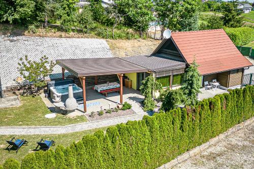an overhead view of a house with a roof at Ladybug House With Whirlpool - Happy Rentals in Fokovci