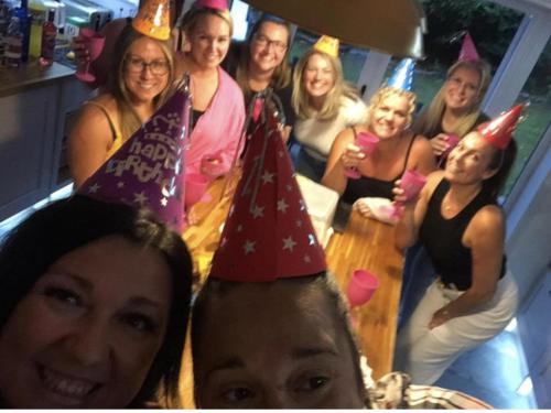 a group of women wearing party hats on their heads at 5BR-10Guests-Fireplace-HotTub-Pets ok - Parking in Battle