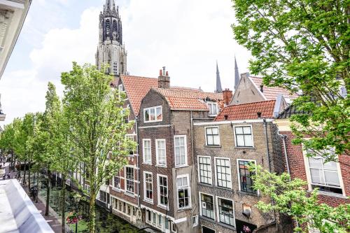 an old building in the city of bruges at Beautiful Apartment With Loft in Delft