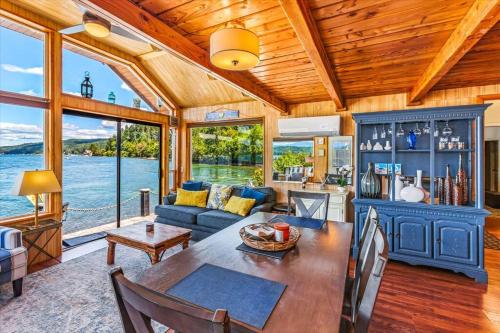 a living room with a table and a couch at Utopia Cove in Union