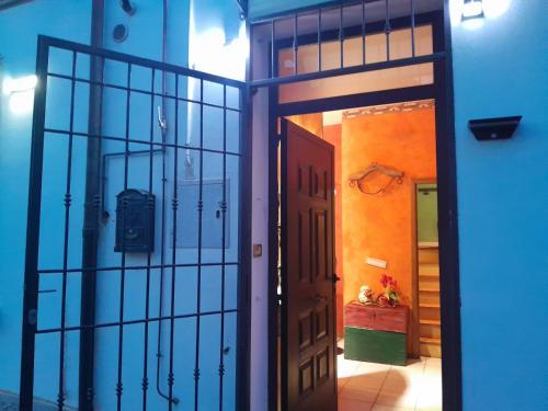 an open door to a room with a door at Casita Esperanza in Copparo