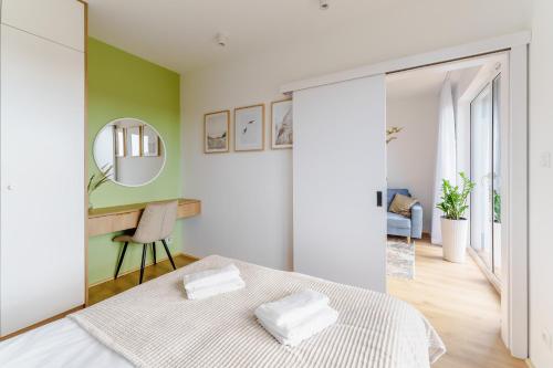 Katil atau katil-katil dalam bilik di Apartament SAIL SurfingBird Dźwirzyno