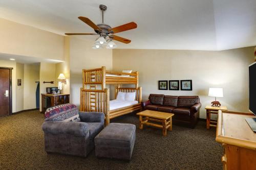 a living room with a bunk bed and a couch at Stoney Creek Hotel Columbia in Columbia