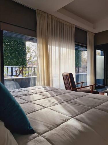 Giường trong phòng chung tại Casa Bontú - Departamento 3, 5ta Sección