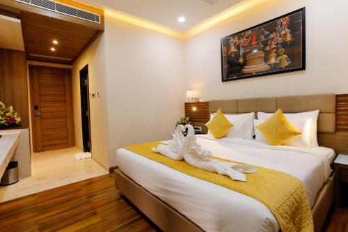 Cama o camas de una habitación en Hotel Dolphin Grand