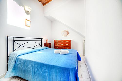Ein Bett oder Betten in einem Zimmer der Unterkunft Cozy Apartment in Castelfiorentino