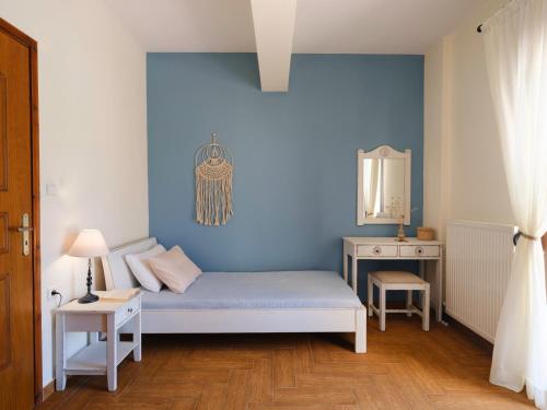 Ένα ή περισσότερα κρεβάτια σε δωμάτιο στο Ageri Traditional Villa