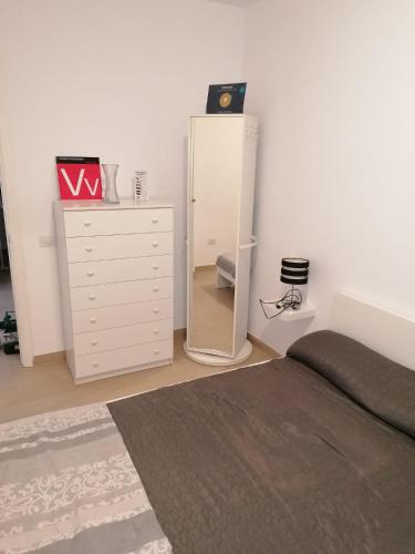 Vuode tai vuoteita majoituspaikassa Colina Apartmen