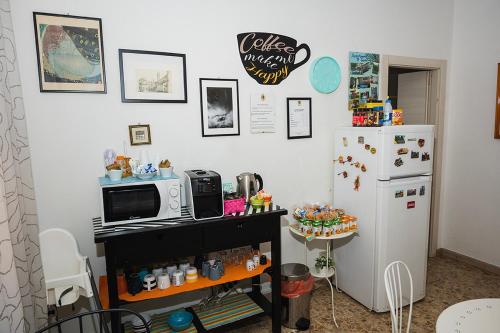Kuchyň nebo kuchyňský kout v ubytování B&B Pisaland