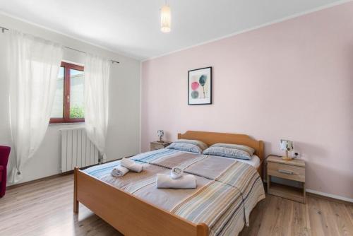 Giường trong phòng chung tại Casa Ninetta