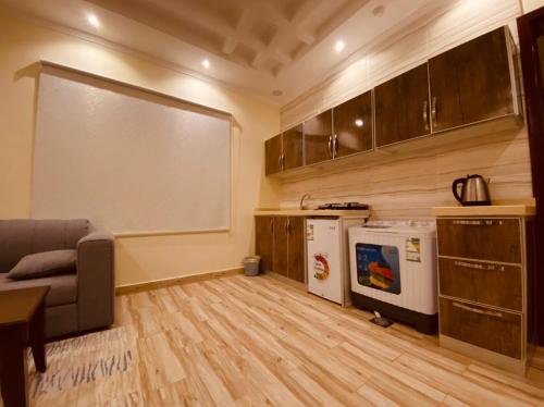 a living room with a large whiteboard in a room at Oasis Residential in Medina