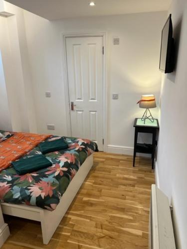 Cama ou camas em um quarto em Amazing Flat 3 in Battersea