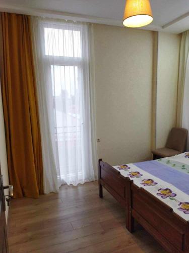 Postel nebo postele na pokoji v ubytování Elmari Home