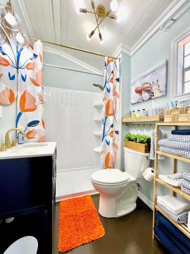 a bathroom with a toilet and a sink at SLEEPS SIX - Rent Entire WATERFRONT CABIN #1 in Etoile