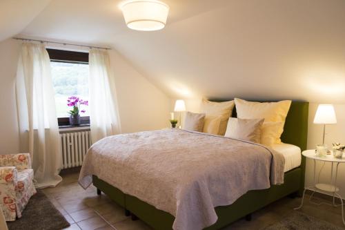 Katil atau katil-katil dalam bilik di Domizil im Weserbergland