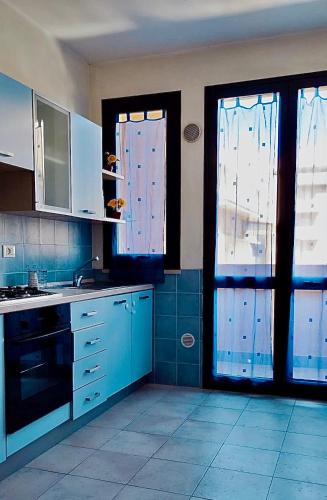 Una cocina o zona de cocina en DGS APARTHOTEL