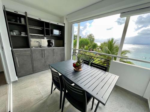 Dapur atau dapur kecil di Karaibes Residence