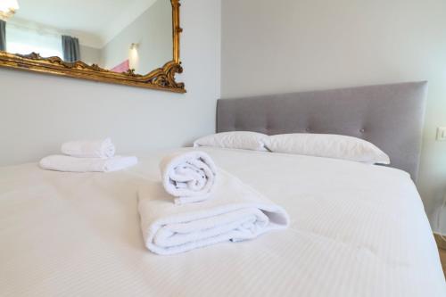 Ένα ή περισσότερα κρεβάτια σε δωμάτιο στο PrimoPiano - Meda 6