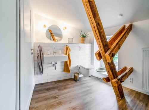 a bathroom with a sink and a toilet at Studio Zwei in Oersberg
