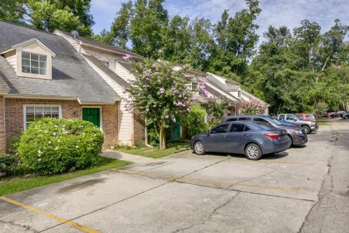 a group of parked cars parked in a driveway at 4 Mi to Dtwn Pet-Friendly Abode in Tallahassee! in Tallahassee