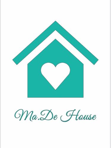 a house with a heart in it and the words me be house at Ma. De House Lago del Turano in Valle Verde