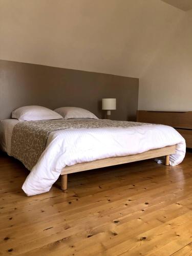 Ένα ή περισσότερα κρεβάτια σε δωμάτιο στο Maison TiaGaran