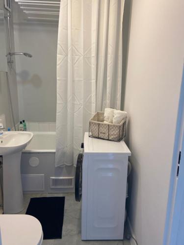 a bathroom with a sink and a toilet and a shower at Pomorska - Żabianka in Gdańsk