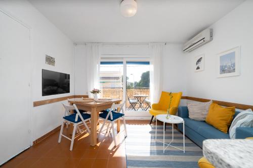 Et opholdsområde på Beach flat with terrace