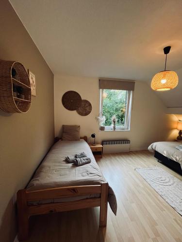 Letto o letti in una camera di Villa de charme chez Malika & Max