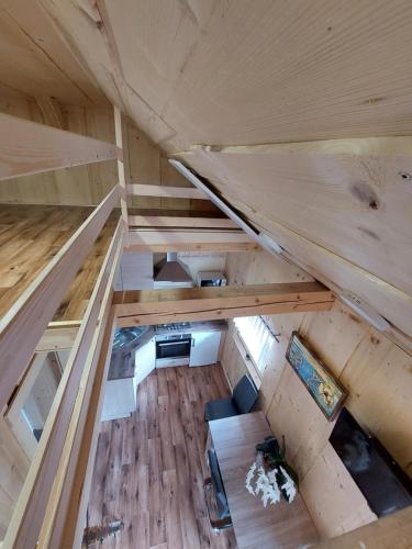 an overhead view of a room in a tiny house at POČITNIŠKA HIŠKA LASTOVKA in Podvolovljek