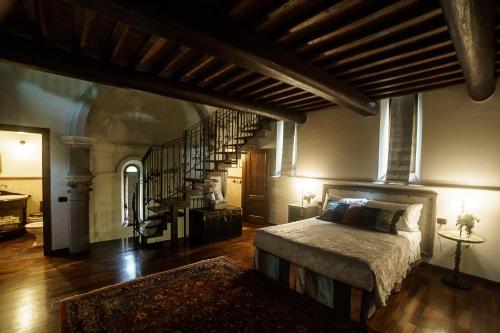 Katil atau katil-katil dalam bilik di Chiesino Dei Vaioni
