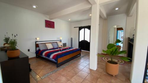 Postel nebo postele na pokoji v ubytování Pent house con terraza o departamento con balcón en el centro de oaxaca