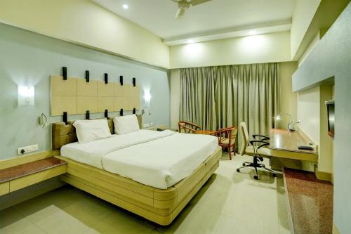 מיטה או מיטות בחדר ב-Palette - Hilife Towers