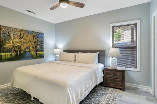 a bedroom with a bed and a window at South Asheville Townhome 12 A in Arden