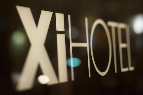 Certificado, premio, señal o documento que está expuesto en Xi Hotel