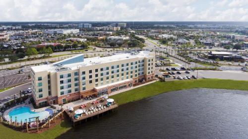 an aerial view of a hotel on the water at Hyatt Place Jacksonville St. Johns Town Center in Jacksonville