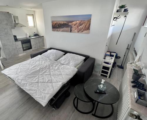 Кровать или кровати в номере Meerfreude Grömitz