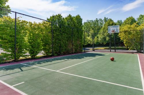 a tennis court with a basketball on it at Residence Inn Boston Franklin in Franklin