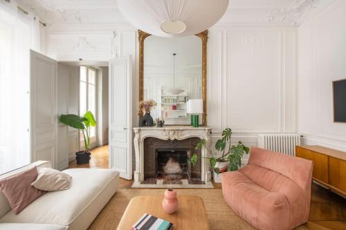 Haussmannien 156m2 avec balcon filant