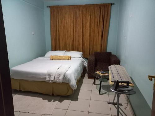 Säng eller sängar i ett rum på Nakuru Lovely 2bedroom Master ensuite